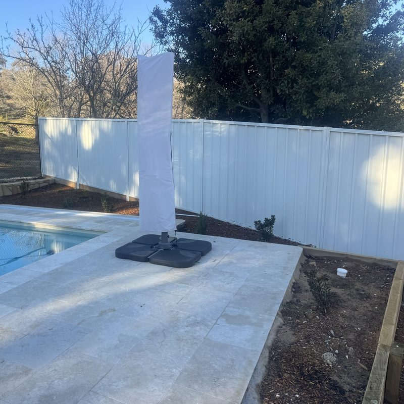 Colorbond boundary fence forming part of a pool barrier